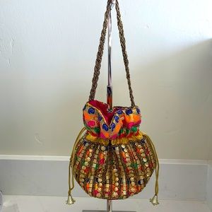 Small ethnic multicolor potli/bucket bag with drawstring closure